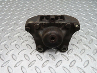 W140 rear left brake caliper used OEM