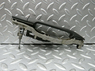 W124 front left exterior door handle used OEM