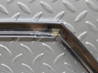 W109 front left door chrome window frame used OEM