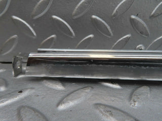 W123 rear left chrome window channel used OEM