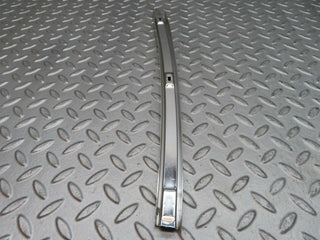 W108 rear left chrome window channel used OEM