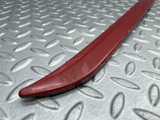 W116 front left passenger side window trim fill used OEM