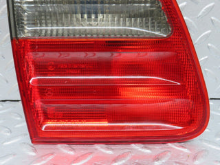 W210 tail light left side used OEM