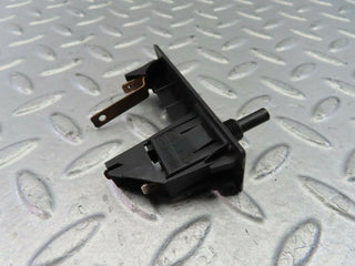 W123 Coupe trunk light switch used OEM