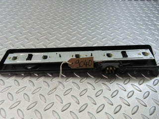 W123 tail light bulb holder right used OEM