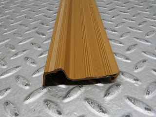 W123 rear right door sill trim palomino used OEM