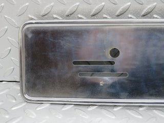 W123 front chrome number plate holder used OEM
