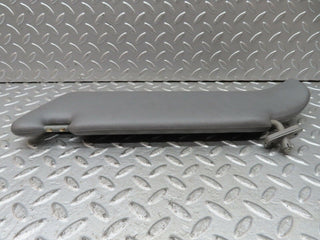 C140 sun visor right side grey used OEM