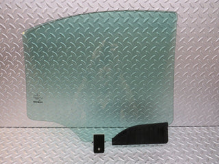 W221 rear left door window glass used OEM