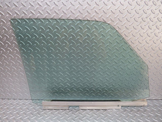W126 front left door window glass used OEM