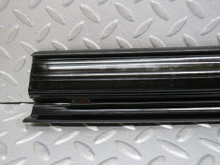W123 front left door sill trim black used OEM