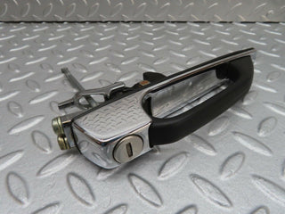 W123 front left exterior door handle used OEM