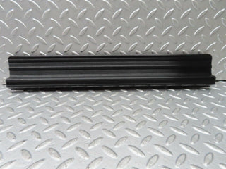 W123 rear right door sill trim black used OEM
