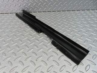 W123 Coupe cable channel cover front left used OEM