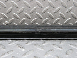 W123 front left door sill trim black used OEM