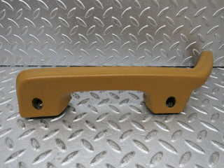 W123 left interior door handle palomino used OEM