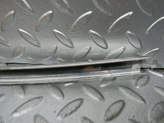 W108 rear left chrome window channel used OEM