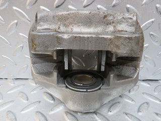 W116 rear left brake caliper used OEM