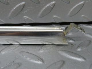 W108 rear left door window chrome channel used OEM
