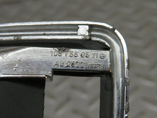 W123 chrome frame for door opener left used OEM