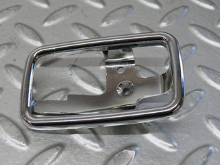 W123 chrome frame for door opener right used OEM