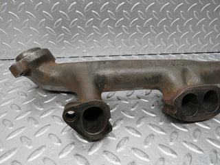 W123 exhaust manifold used OEM