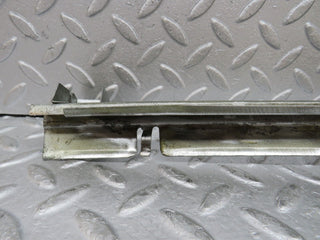 W109 front left door window channel used OEM