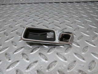 W123 chrome frame door opener front left used OEM