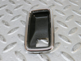 W123 chrome frame for door opener left used OEM