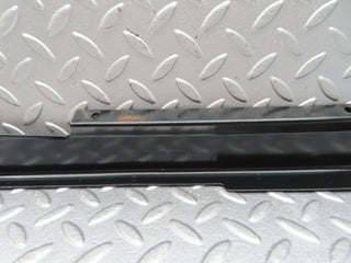 W123 cable channel cover front left used OEM