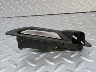 W124 interior door handle front right used OEM