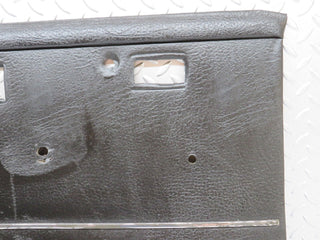 W108 rear left door card black used OEM