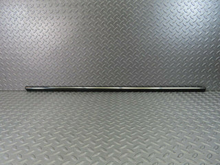 W123 front left door lower trim new OEM