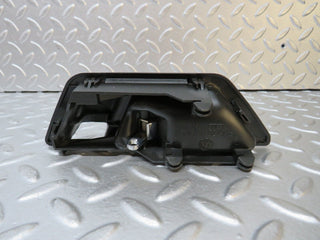 W124 interior door handle front right used OEM