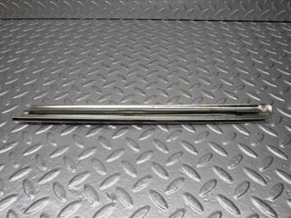R107 SLC rear left window chrome used OEM