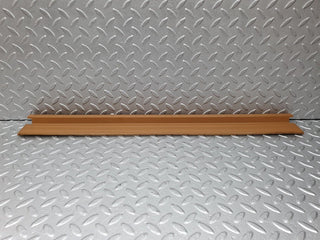 W124 front right door sill trim palomino used OEM