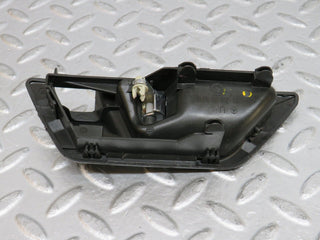 W124 interior door handle front left used OEM