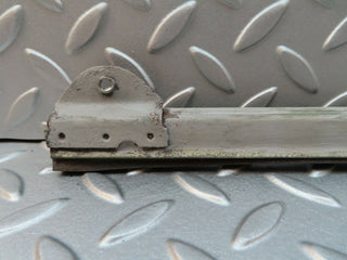 W108 rear right door glass holder used OEM