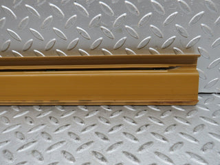 W123 rear right door sill trim palomino used OEM