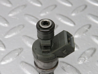 W124 Cabriolet fuel injector used OEM