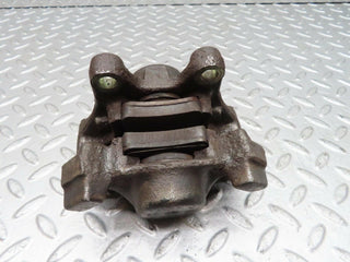 W140 rear left brake caliper used OEM