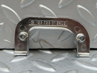 W123 left interior chrome door latch trim used OEM
