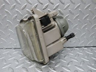 R129 SL front left fog light used OEM