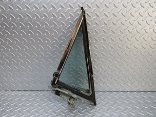 W109 front left quarter window glass used OEM