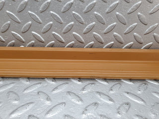 W124 front left door sill trim palomino used OEM