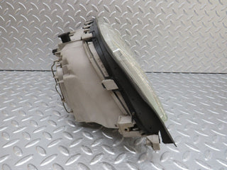 W202 headlight left side used OEM