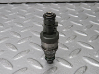 W124 Cabriolet fuel injector used OEM