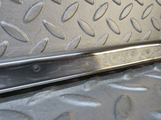 W109 front left door sill chrome used OEM