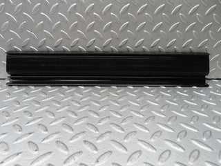 W123 rear right door sill trim black used OEM
