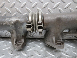 W126 exhaust manifold left used OEM